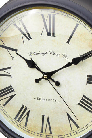 Vintage-style robello black lined rim wall clock with cream aged face black roman numerals and dark gray metal frame