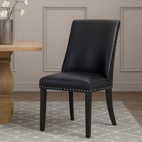 Rodeo black leather effect dining chair with silver nailhead trim and sleek black leather look