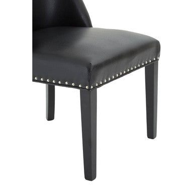 Rodeo black leather effect dining chair with silver nailhead trim along the seat edge in black leather