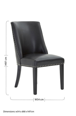 Black leather effect dining chair with studded detailing perfect for rodeo style dining rooms