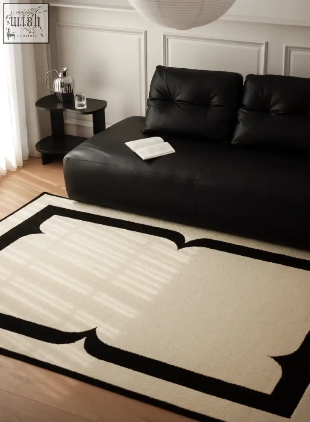 Black and cream rogers rectangular living room rug with bold geometric border perfect for under coffee table set