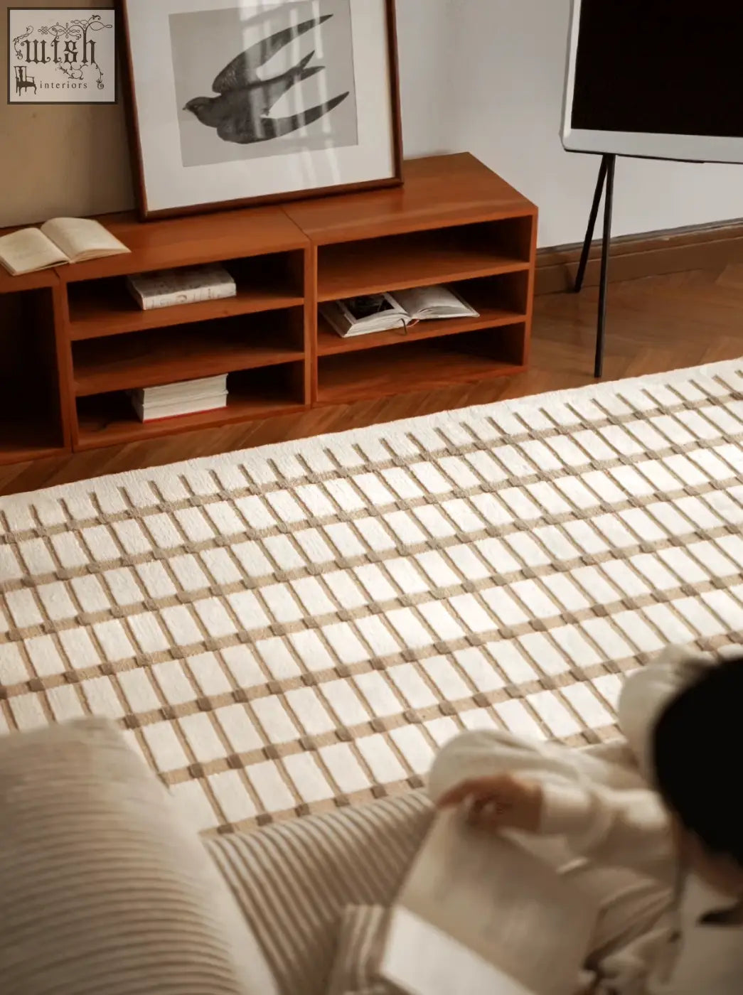 Beige and cream woven rolland rectangular living room rug with grid pattern perfect for under a coffee table set