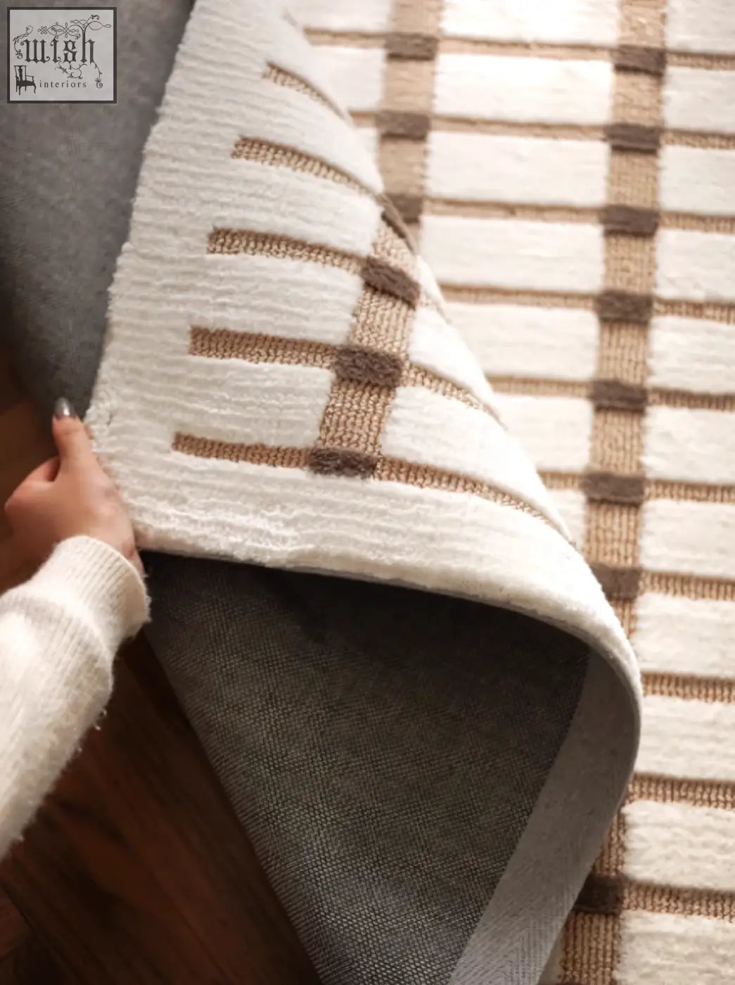 Rolland rectangular living room rug in cream and beige woven textured stripes perfect for under a coffee table set