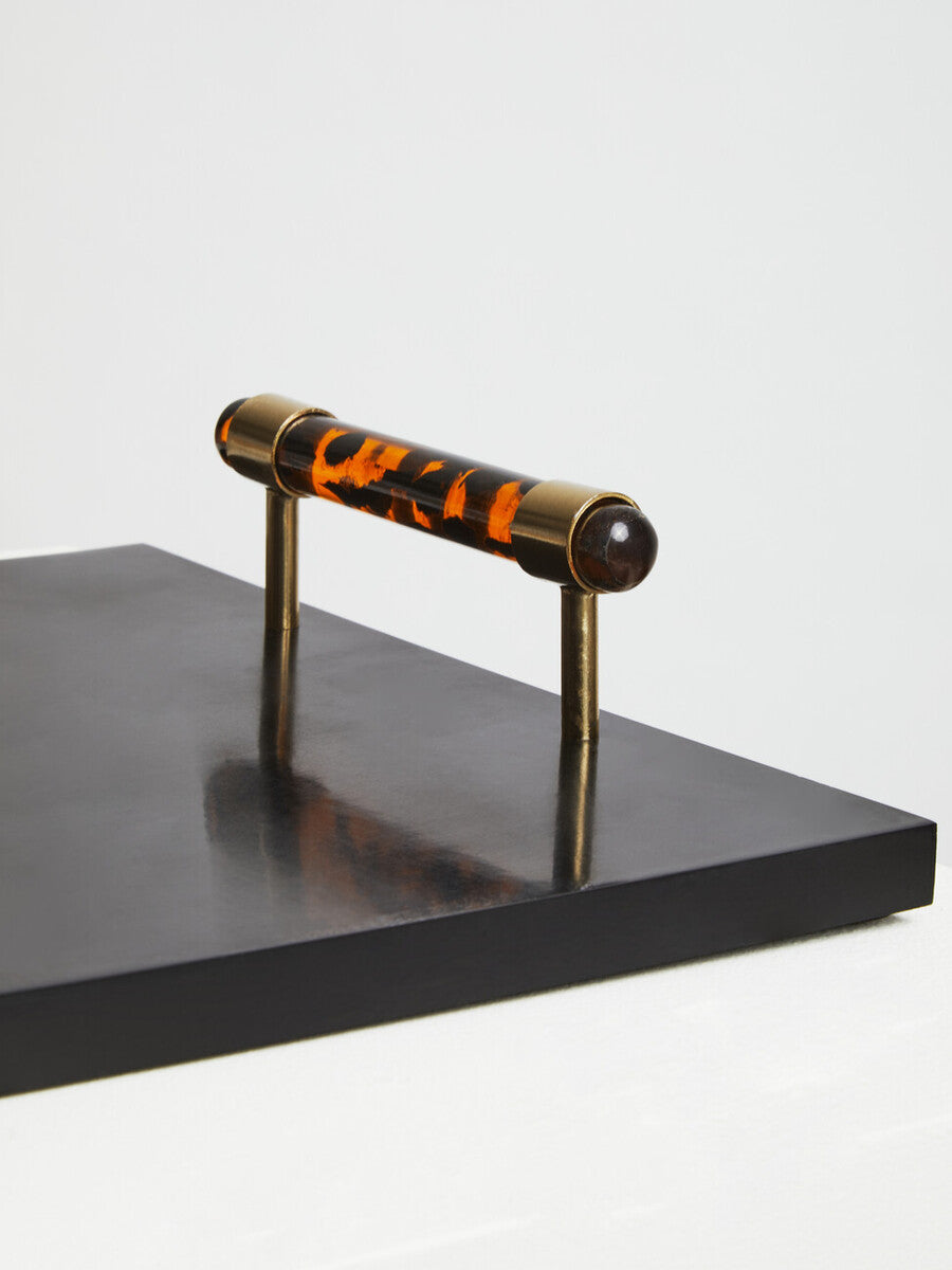 Roma rectangular tortoise shell tray with glossy black surface and ornate tortoise shell resin handle in polished brass