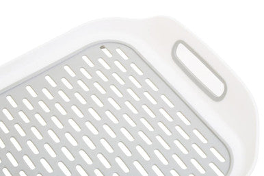 White plastic romm sink mat with gray perforated surface and integrated handle for kitchen sink protection