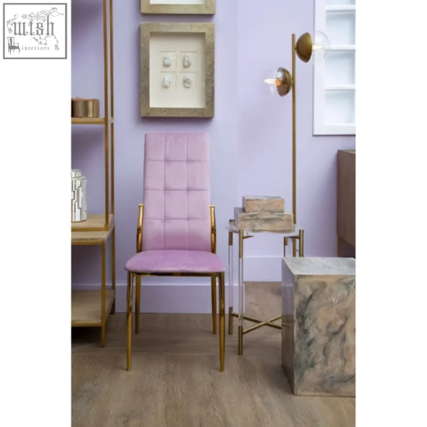 Pink tufted chair with gold metal frame next to rosado marble effect side table and stool set
