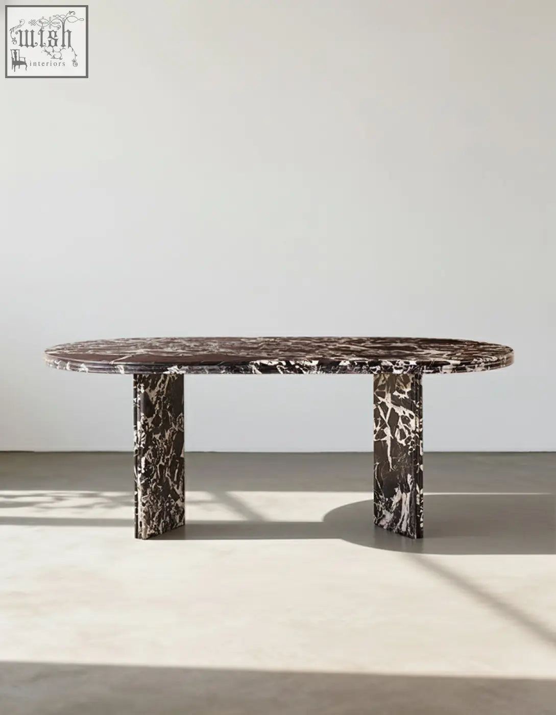 Rosaline black marble dining table oval with dark brown and white veined marble top and matching pedestal legs