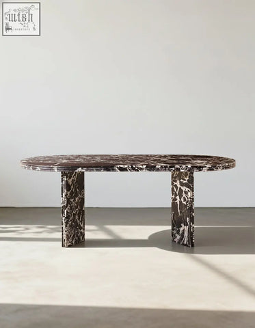 Rosaline black marble dining table oval with dark brown and white veined marble top and matching pedestal legs