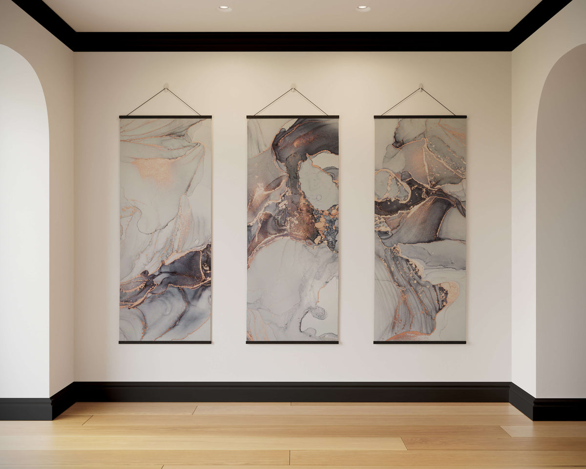 Three vertical rose gold marble art panels with abstract swirls in gray white and gold marble design tapestry