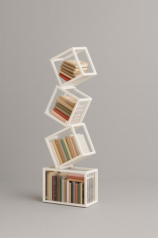 White rotating cube bookshelf with modern stacked design perfect for stylish storage and display