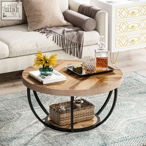 Round coffee table with light wood top and black metal frame featuring open lower shelf with woven basket storage