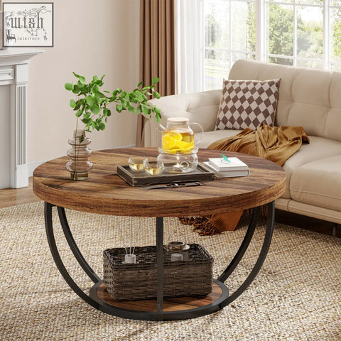 Rustic round coffee table with distressed wood top black metal legs and open storage shelf below