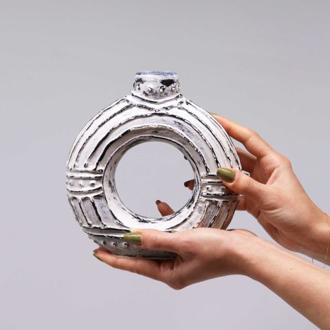 Silver handcrafted ceramic round donut shaped vase with textured rings and decorative horizontal bands for dry flowers