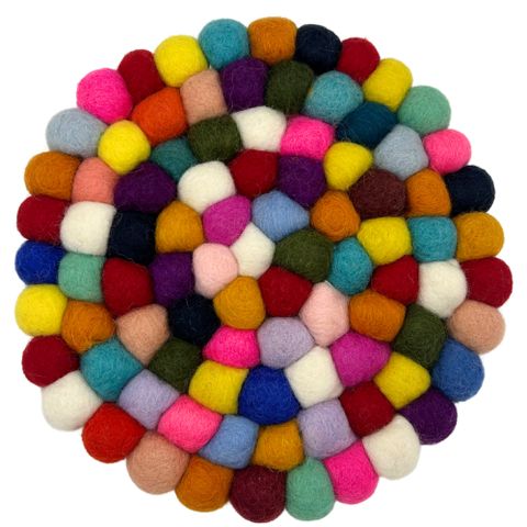 Round felt ball placemat featuring multicolored wool pom-poms arranged in a vibrant circular pattern