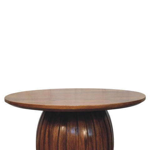 Round fluted coffee table with smooth polished wooden surface and fluted pedestal base perfect for living rooms