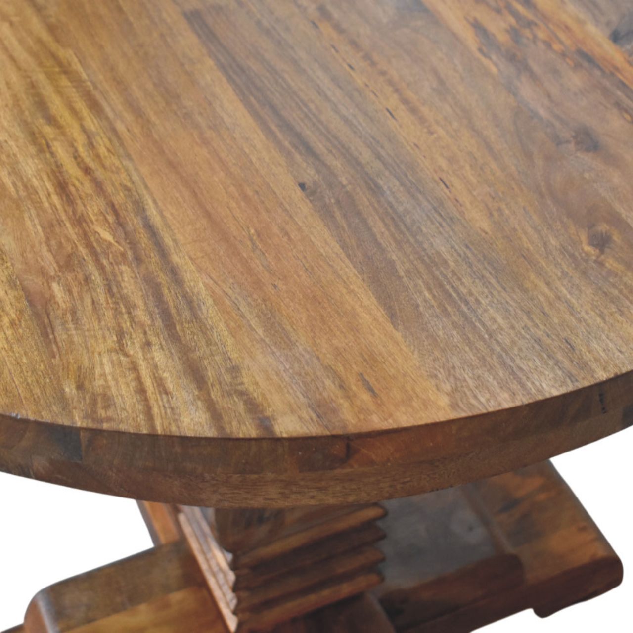 Rounded wooden dining table with a warm natural finish and visible grain patterns perfect for any dining space