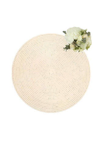 Cream-colored woven rattan placemat with textured circular pattern in sand colour set of 4 for table decor