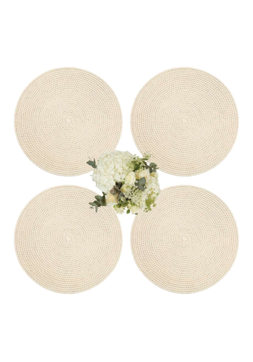 Set of four beige woven round and round rattan placemats with a natural textured pattern for table use