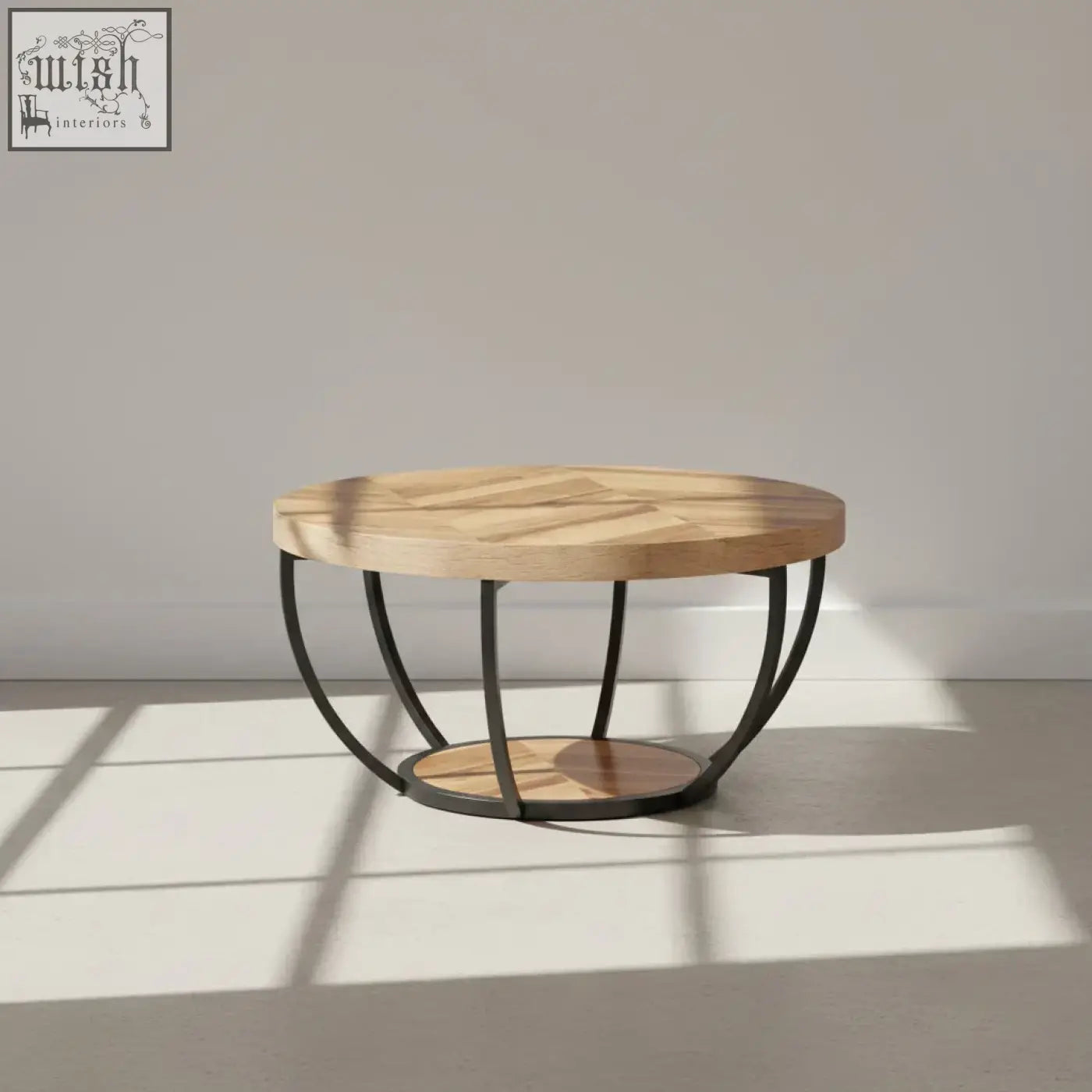 Round wooden coffee table with intricate herringbone light wood top and black metal legs with 2-tier shelves