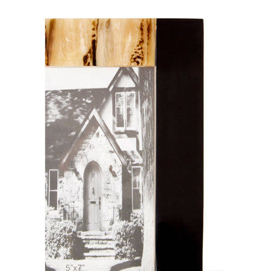 Rustic wooden framed rova 5x7 photo frame holding a black and white photo of a stone house with arched door and steps