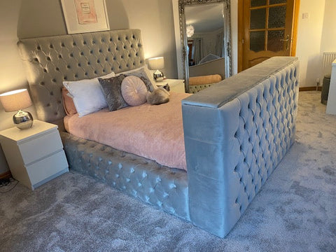 Light blue tufted velvet royal tv bed with matching headboard and footboard fits king size tvs perfectly