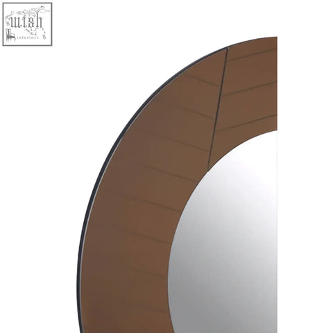 Brown round wall mirror with sleek modern frame perfect for stylish wall mirror decor in any room