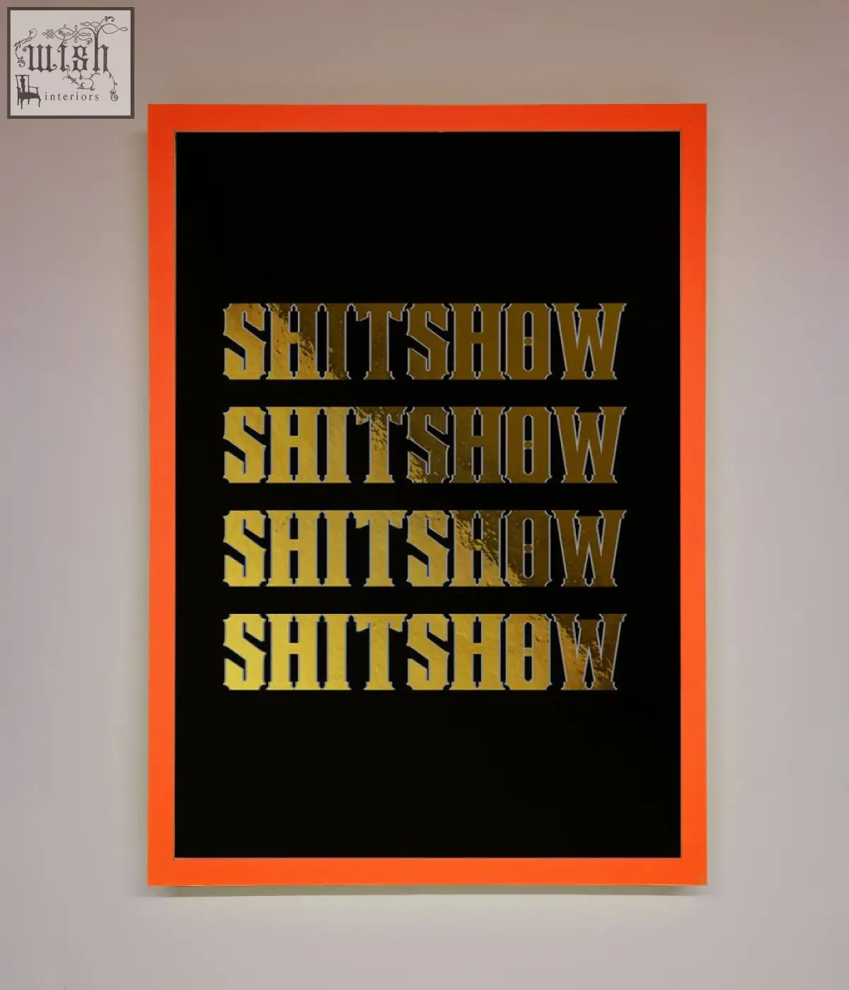 A bold rude quote foil print with distressed gold foil text repeated on black in an orange frame