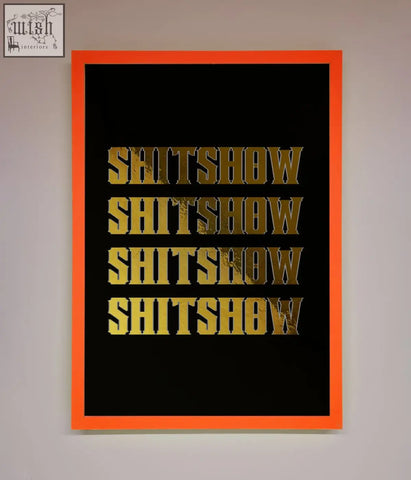 A bold rude quote foil print with distressed gold foil text repeated on black in an orange frame