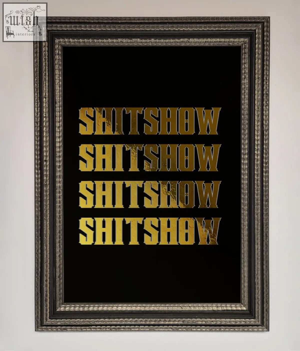 Black framed rude quote foil print with bold gold foiled shitshow text repeated four times in a stacked layout