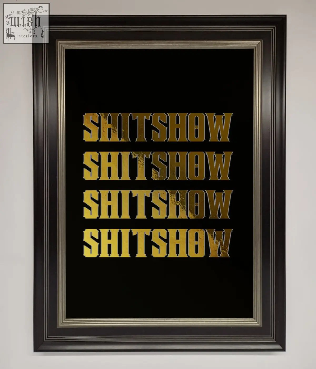 Black framed rude quote foil print with gold foil lettering spelling shitshow repeated in bold blocky font