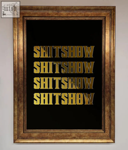A rude quote foil print featuring the word shitshow repeated in bold textured gold on black in a framed art print