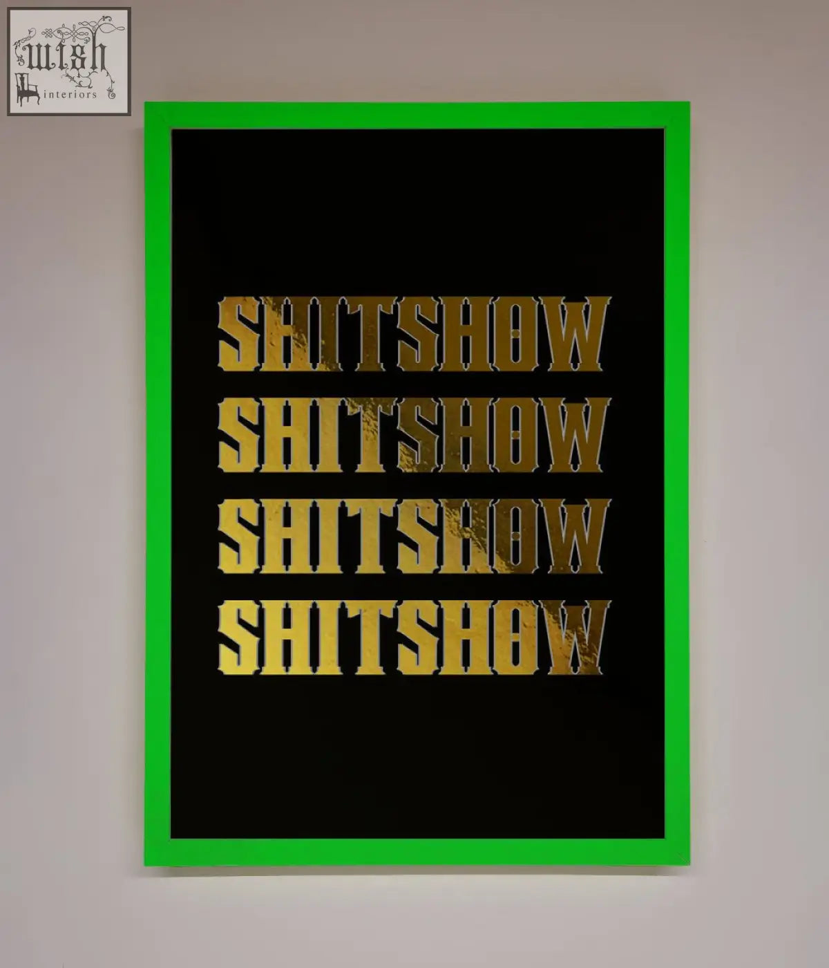 A rude quote foil print poster with bold black frame vibrant green border and gold textured lettering saying shitshow