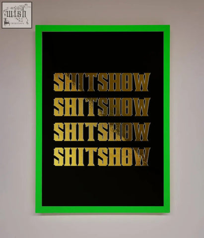 A rude quote foil print poster with bold black frame vibrant green border and gold textured lettering saying shitshow
