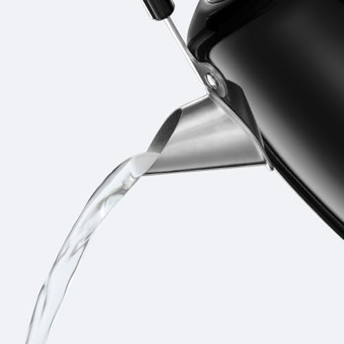 Sleek black russell hobbs electric kettle with stainless steel and grey accents pouring water with perfect pour spout