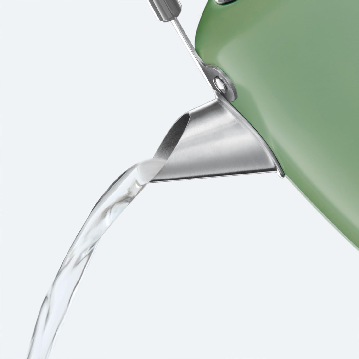 Matte green russell hobbs electric kettle with stainless steel handle and perfect pour spout pouring clear water