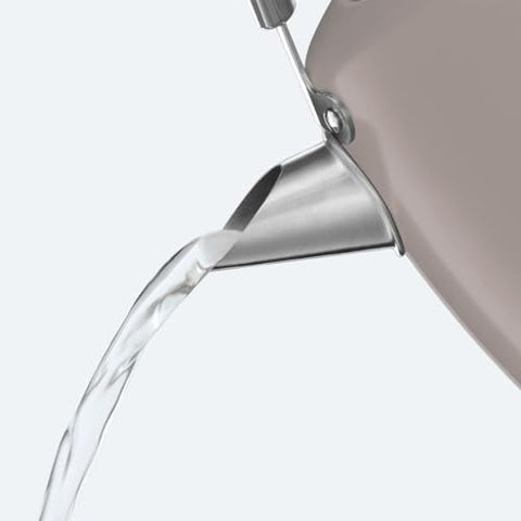 A sleek beige russell hobbs electric kettle with stainless steel handle and perfect pour spout for fast boiling