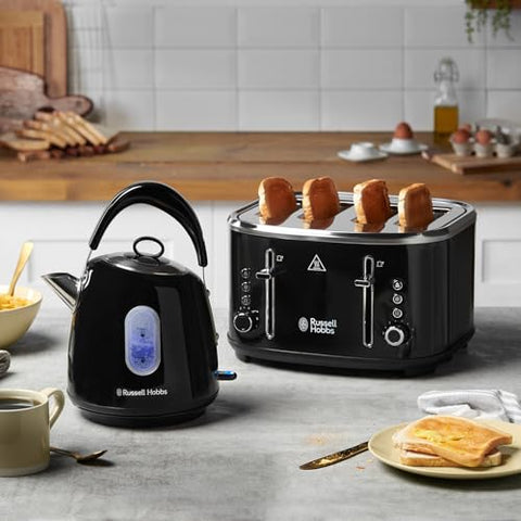 Black russell hobbs four-slice toaster with silver dials paired with stainless steel kettle featuring perfect pour spout