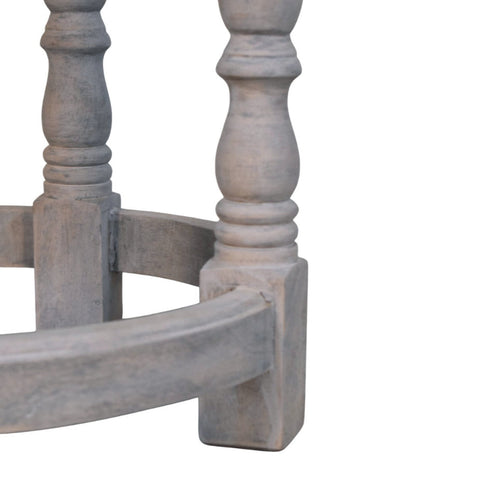 Rustic charm stool gray distressed wood table leg with turned spindles and curved base shown from the back side
