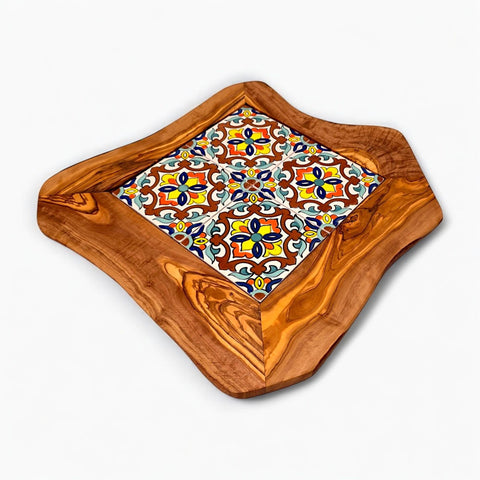 Rustic olive wood ceramic tray with colorful floral ceramic tile inset on a natural handmade square serving board