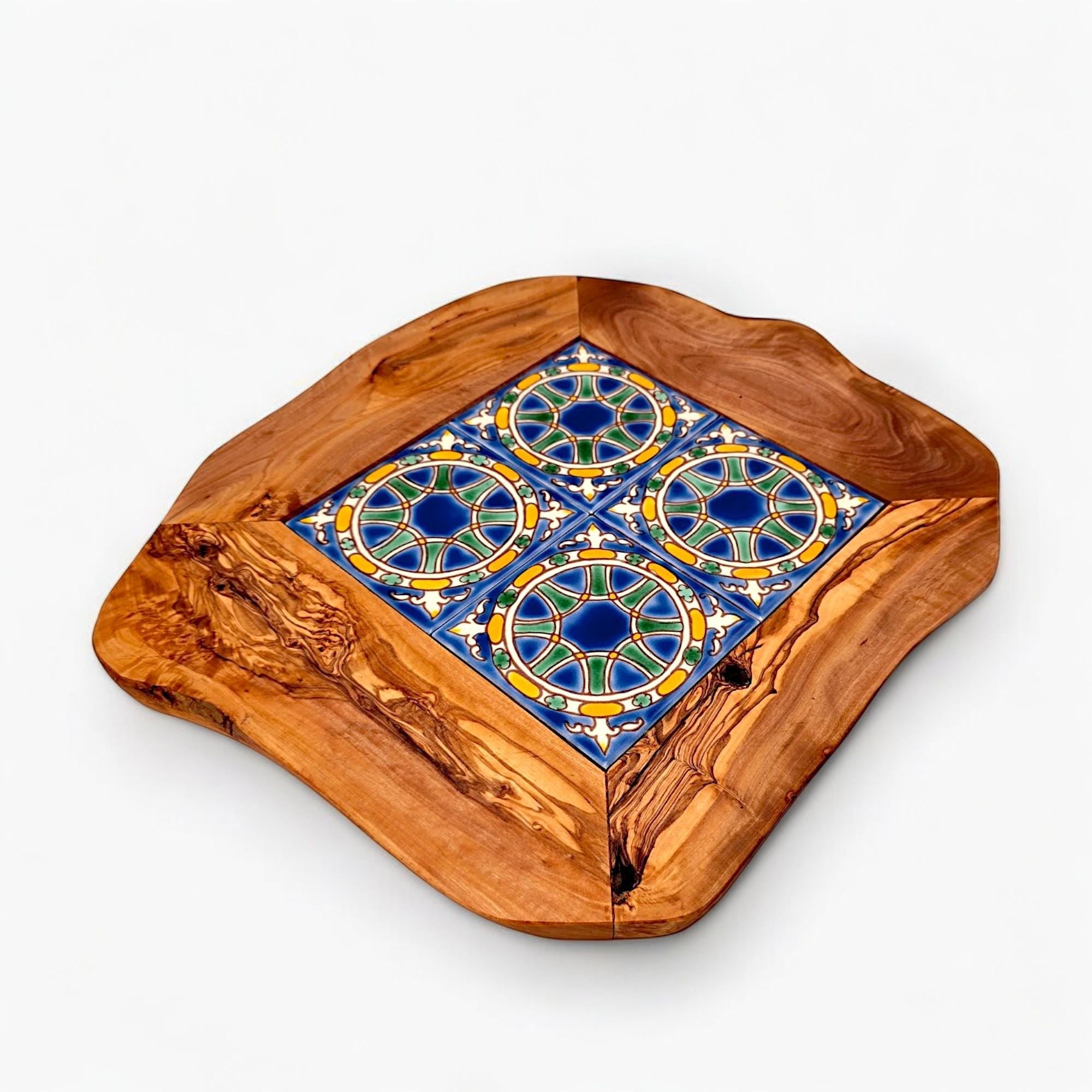 Rustic olive wood ceramic tray with natural edge and vibrant blue green yellow and white tiles perfect for serving