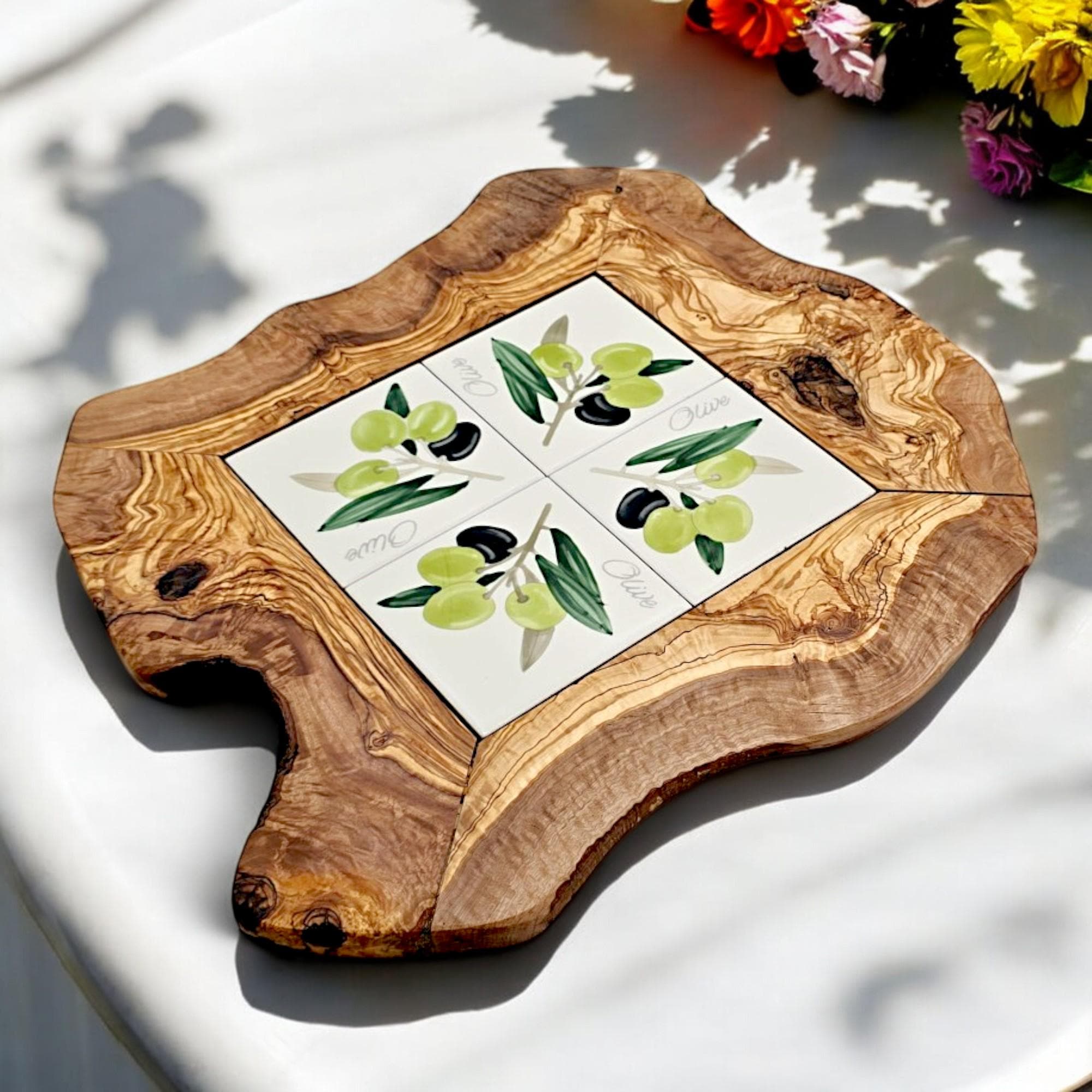 Rustic olive wood ceramic tray featuring hand-painted green and black olives on white tiles in a natural wood frame