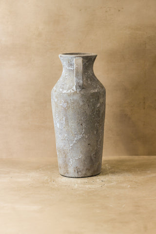 Rustic indonesian tall gray ceramic pot with narrow neck and two vertical handles for nature-inspired interiors