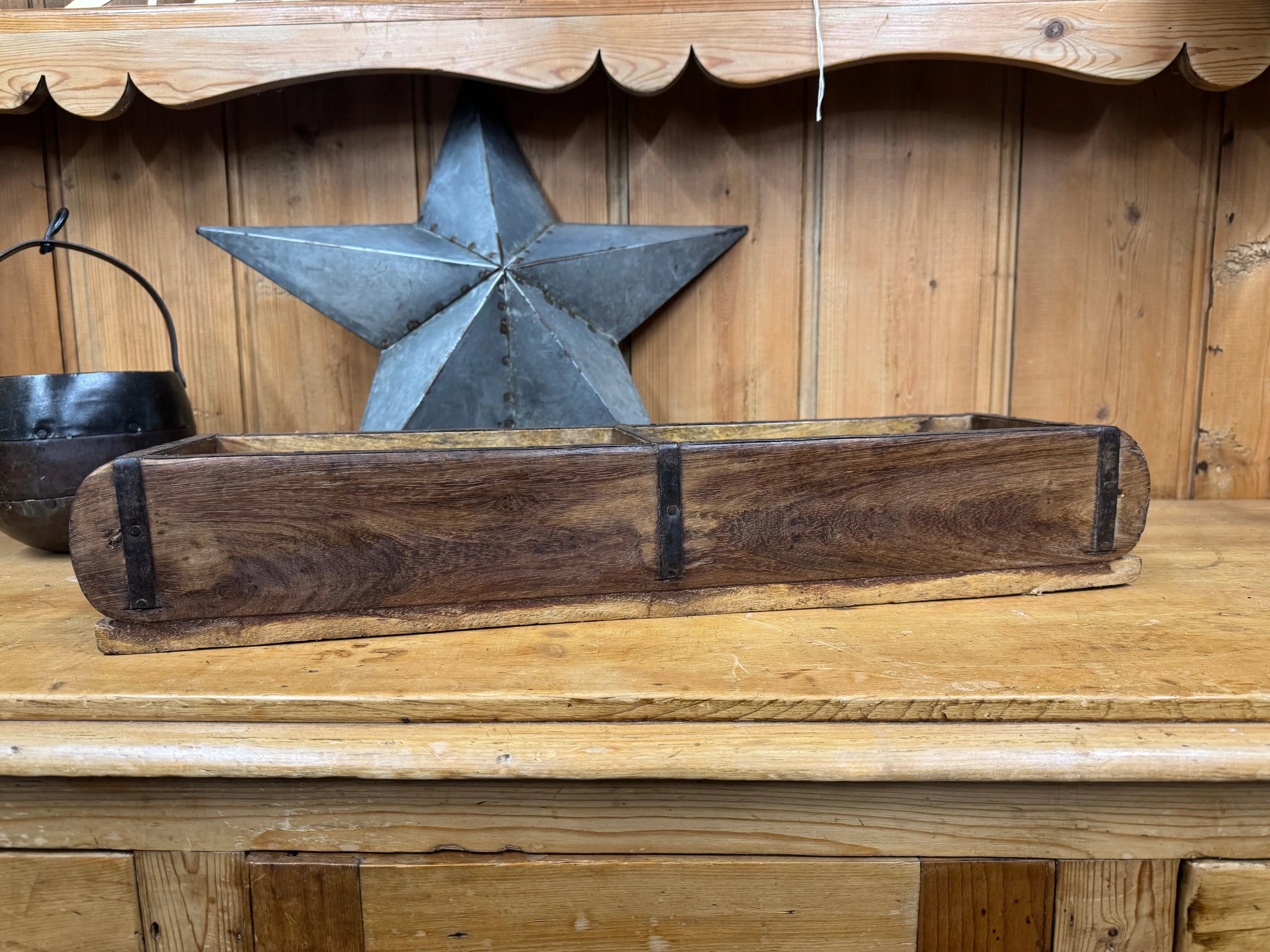 Dark brown wooden double brick trough with black metal reinforcements for rustic herb planter or storage box tray