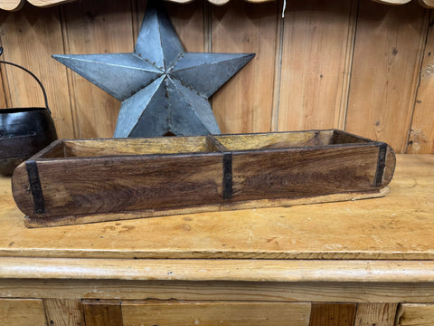 Rustic wooden double brick mould with dark brown weathered wood and black metal reinforcements for planting or storage