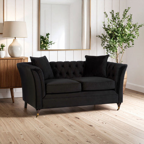 Black velvet tufted sabrina 2-seat onyx sofa with rolled arms and dark wooden legs perfect for cozy seating