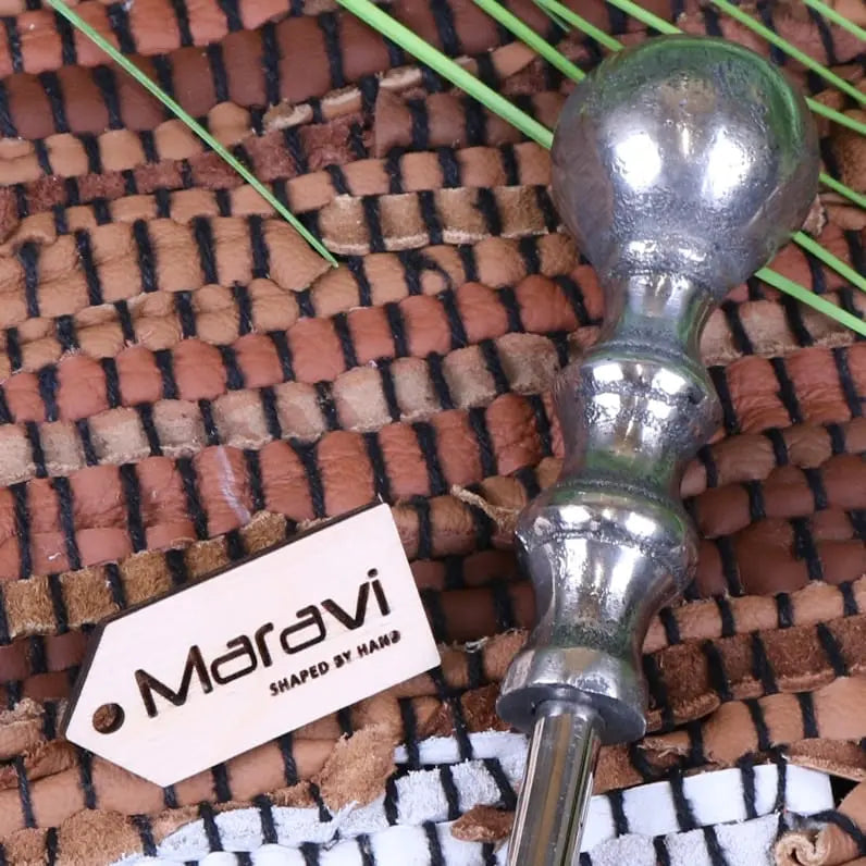 Silver-handled sagara long handled shoe horn with polished knob and segmented shaft in distressed metal finish 54cm