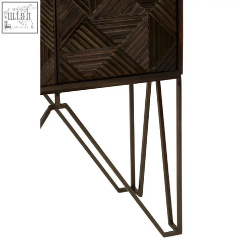 Dark brown wooden saira cabinet with geometric inlay pattern, slim iron legs, and slim iron handles