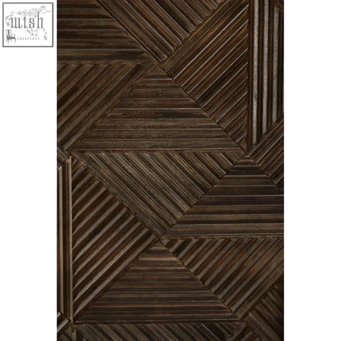 Dark brown woven saira cabinet rug with geometric interlocking triangles and slim iron handles detail