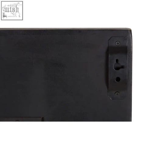 Black plastic mounting bracket with screw holes and keyhole slot on the back of saira wall mirror for easy wall mirror hanging