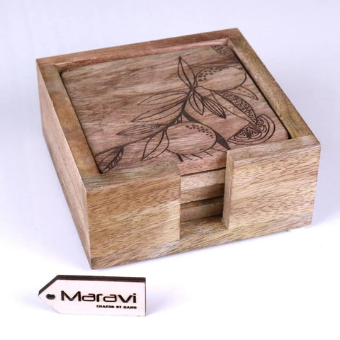 Handcrafted mango wood coasters with engraved citrus design in natural wood finish and matching square wood box